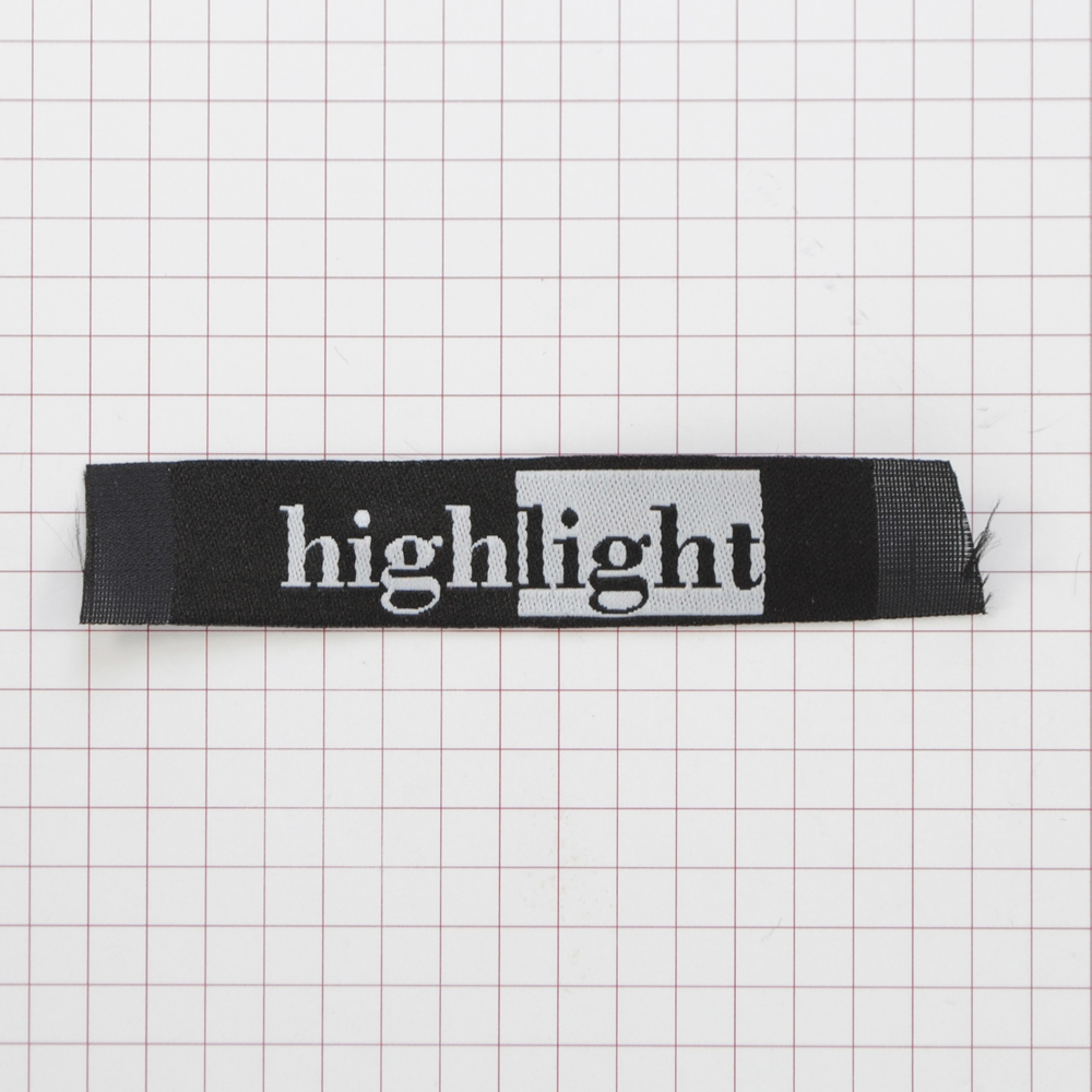Этикетка тканевая High Light 1,5см черная и белый лого /70 atki/, шт. Вышивка / этикетка тканевая