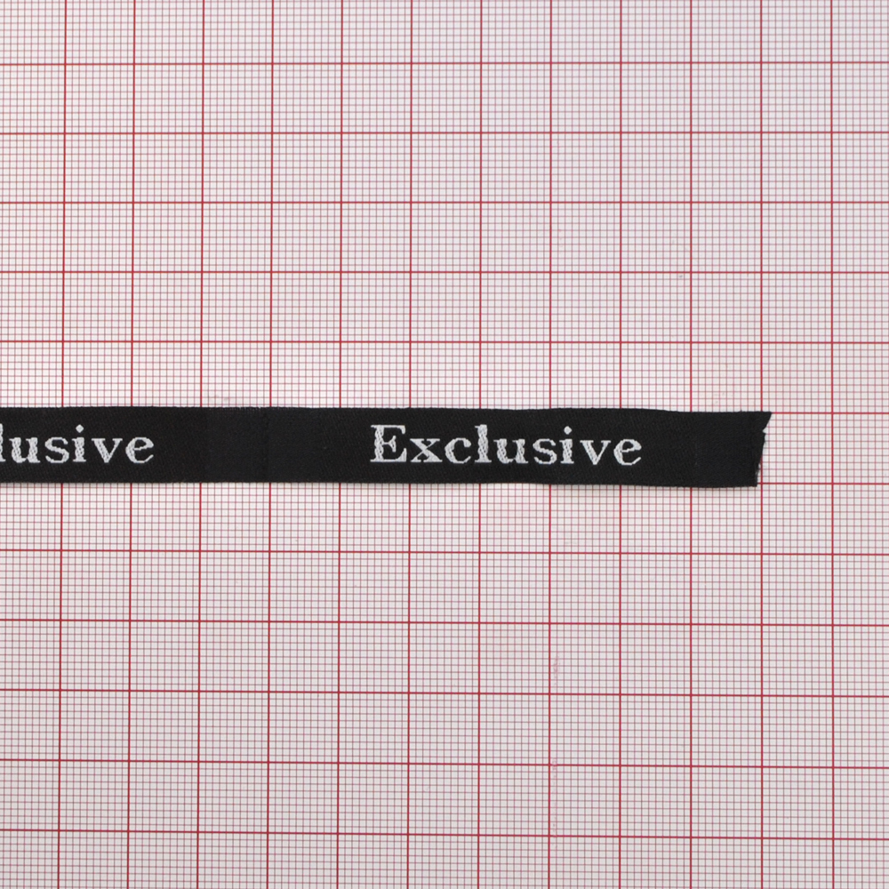 Этикетка тканевая вышитая Exclusive №6A, 1*7см черно-белая /atksatin/. Вышивка / этикетка тканевая