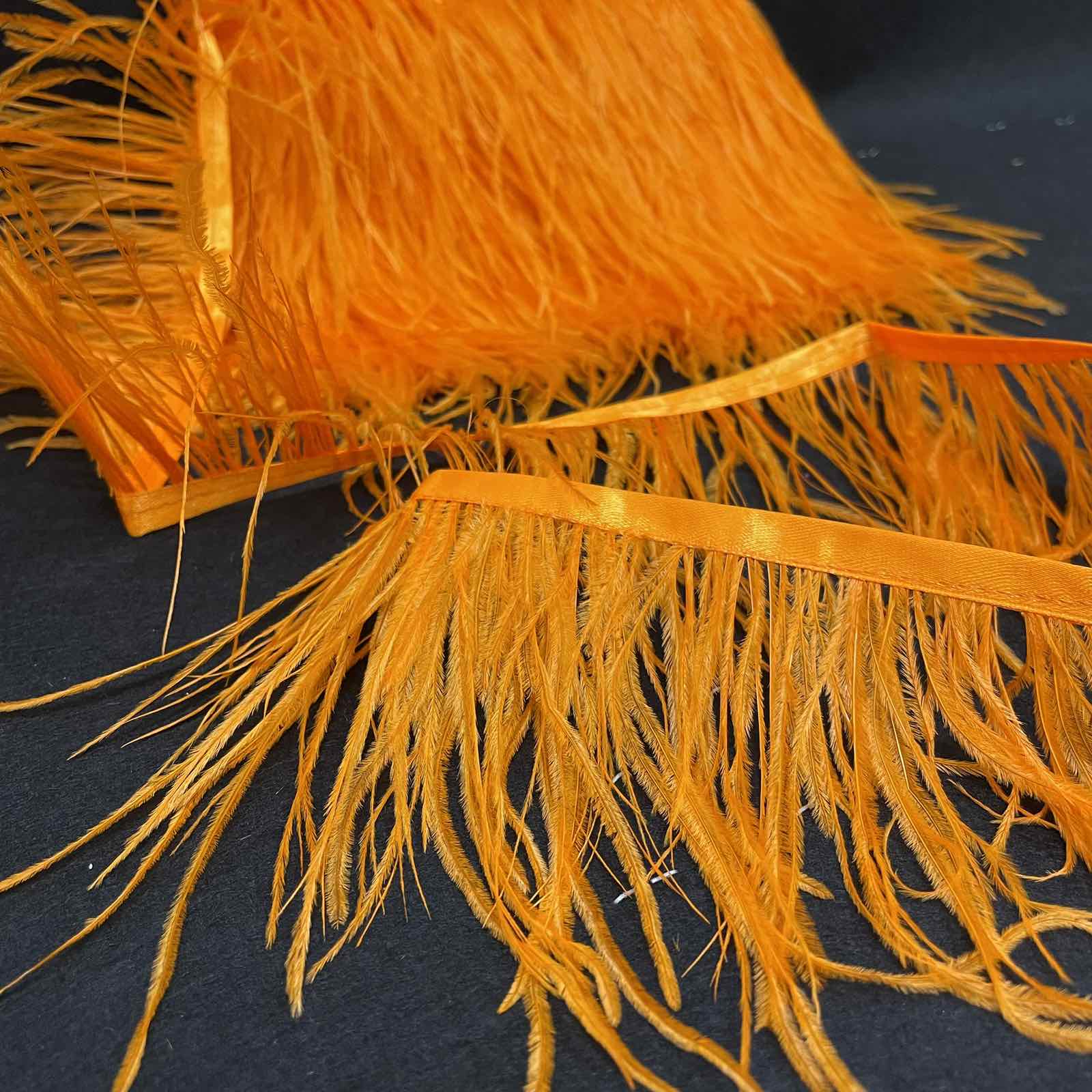 Перья в рулоне 10-14см, оранж., ярд. Перья