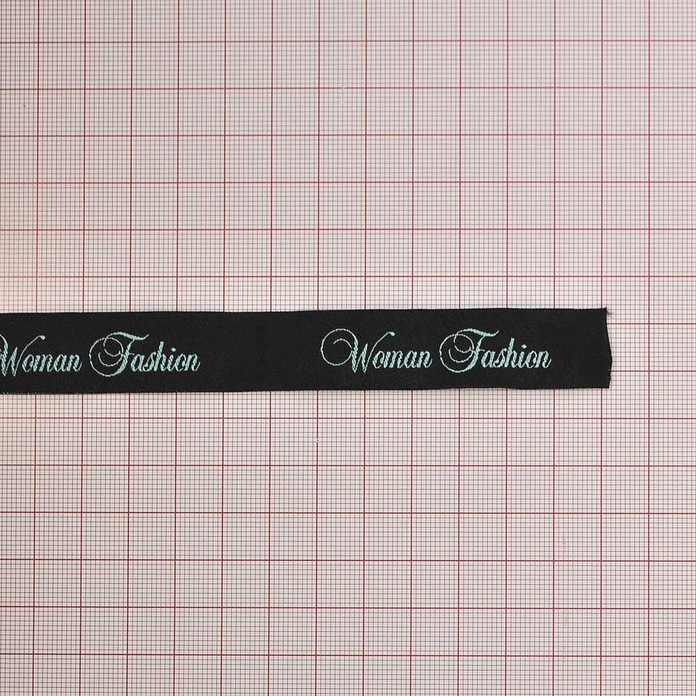 Этикетка тканевая вышивка Woman Fashion №2  1,8 см  черная, голубой лого, шт. Вышивка / этикетка тканевая