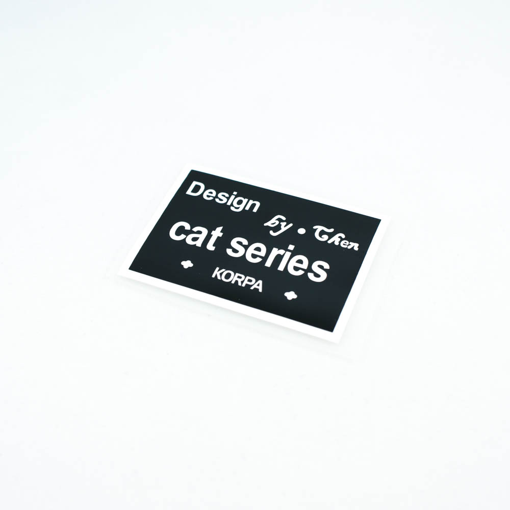 Термоаппликация резиновая "Cat series" 55*40мм черная прямоугольная+белый лого шт. Термоаппликации Резиновые Клеенка