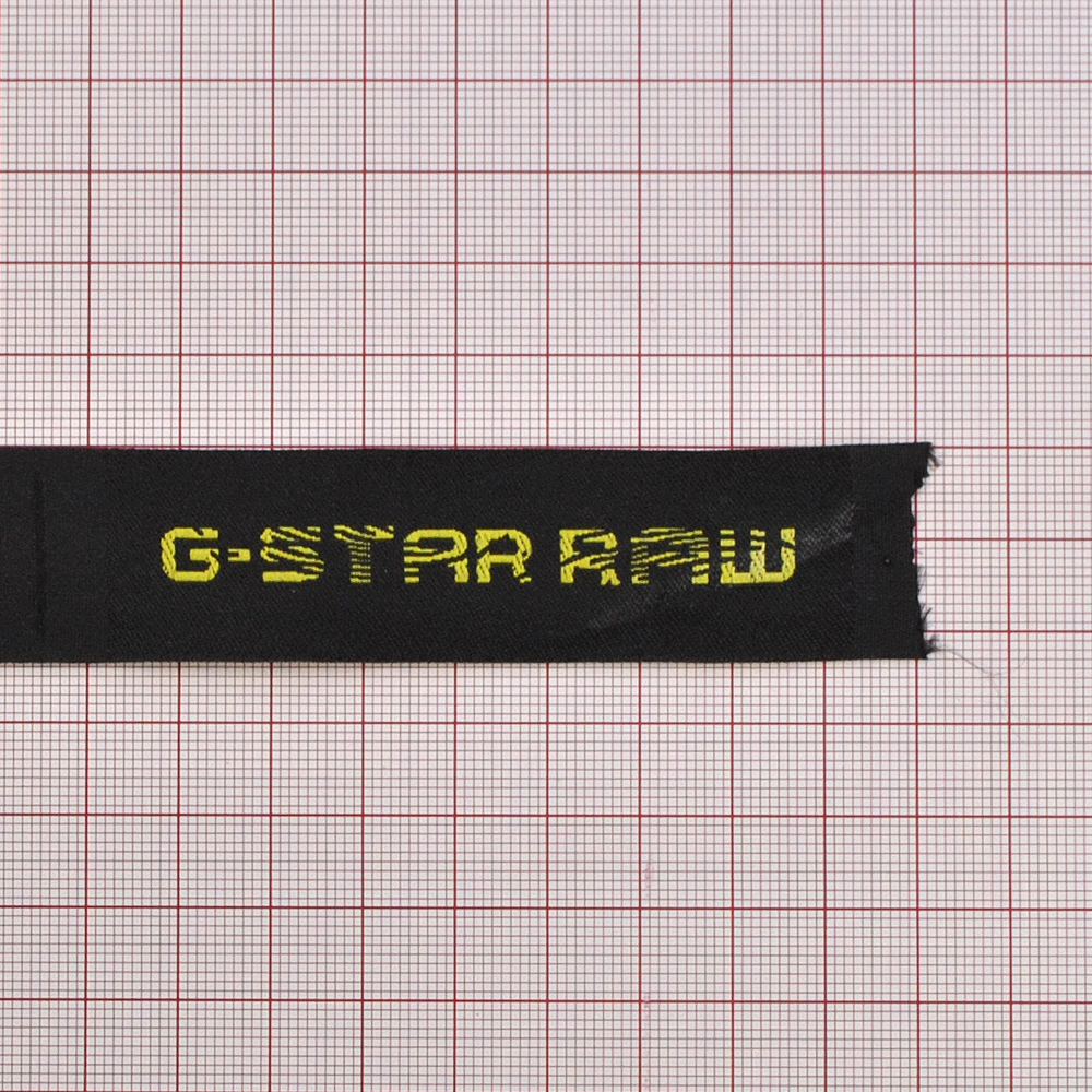 Этикетка тканевая вышитая G-Star Raw, черная, 2,3см. Вышивка / этикетка тканевая