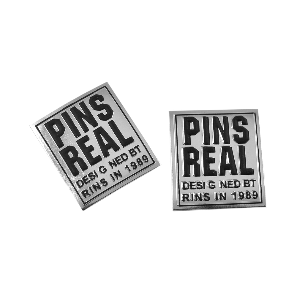 Лейба пластик PINS REAL 4*3.5см серебро, черный. Лейба кожзам, нубук
