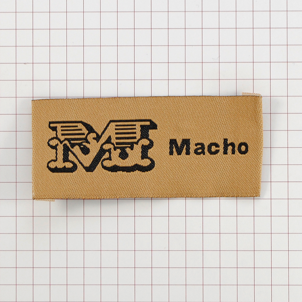 Этикетка тканевая вышитая шт. Macho 3*7см коричневая, черный, шт. Вышивка / этикетка тканевая