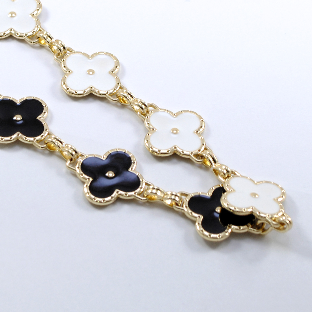 Тесьма с эмалью,  2,2см, белый, черн., золото, ярд. Тесьма из страз