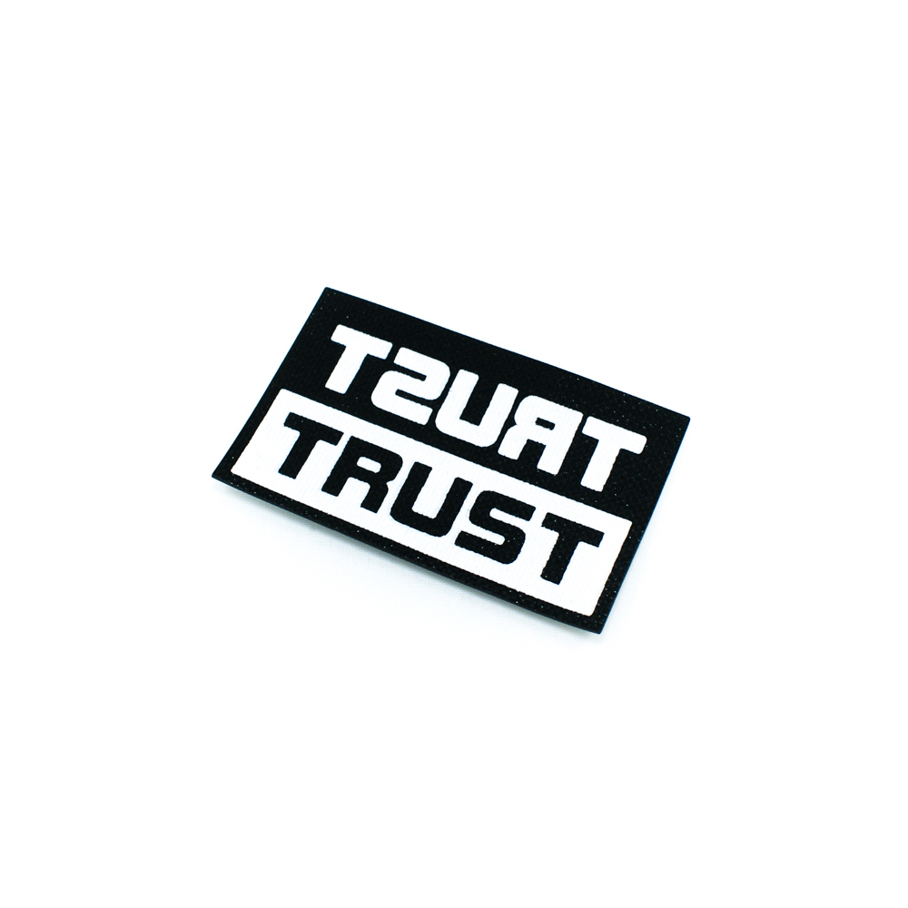 Нашивка резиновая TRUST 4,2*6,5см черный, белый, блестки, шт. Лейба Резина