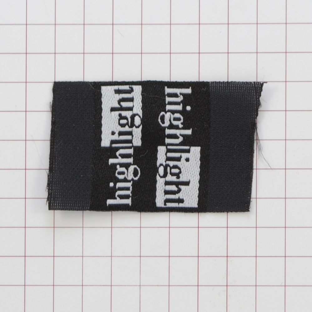 Этикетка тканевая High Light 2,5см черная и белый лого /флажок, 70 atki/, шт. Вышивка / этикетка тканевая