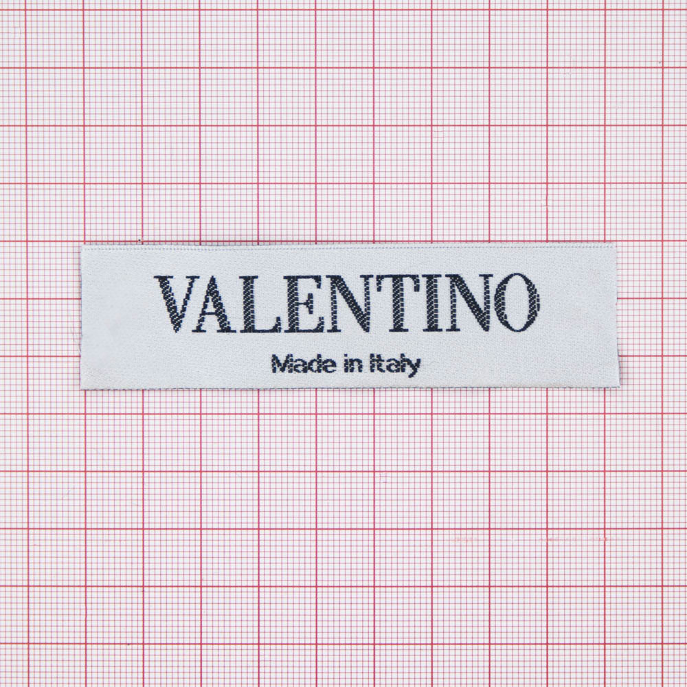 Этикетка тканевая вышитая Valentino 96х25 белая, 100м. Вышивка / этикетка тканевая