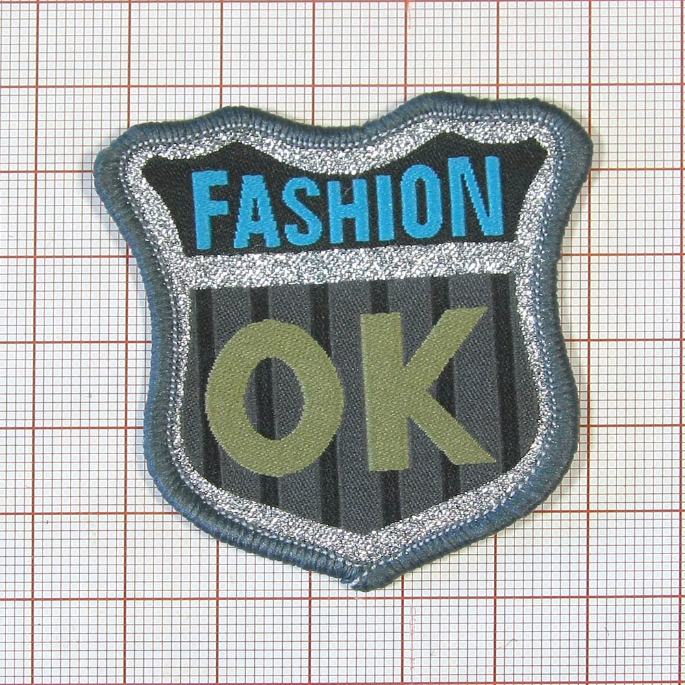 Нашивка тканевая A60 Fashion OK 5,5*6см черно-серая, сине-бежевый лого, шт. Нашивка Вышивка