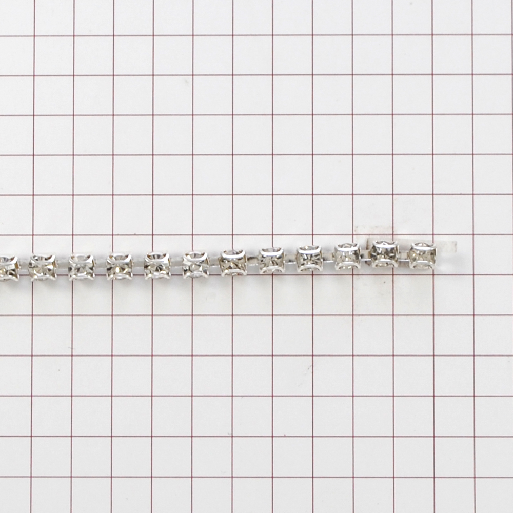 Тесьма стразы Цепь 1 ряд, 0,32см, камни белые, никель, ярд. Тесьма из страз