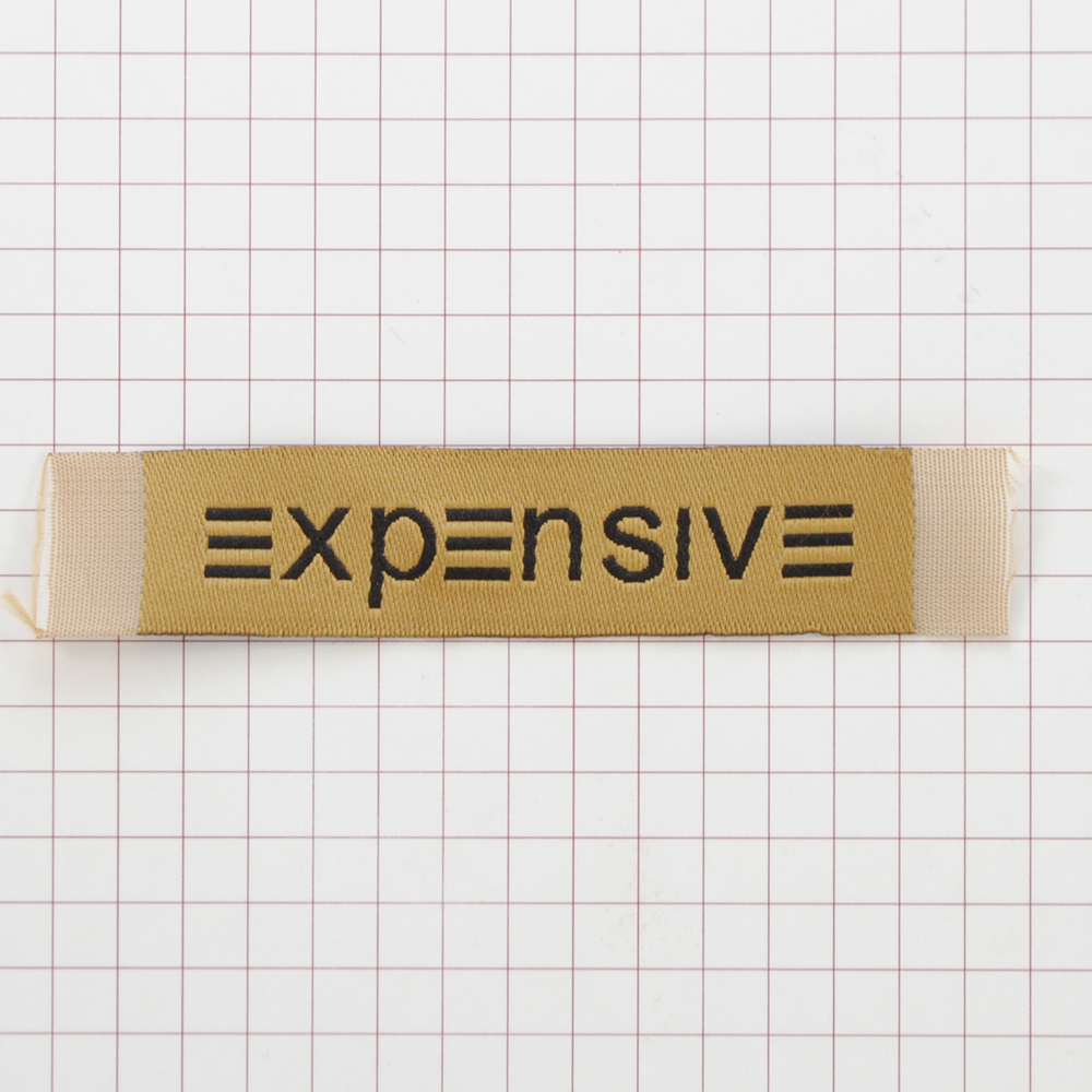 Этикетка тканевая Expensive 1,5см оливка и черный лого /70 atki/, шт. Вышивка / этикетка тканевая