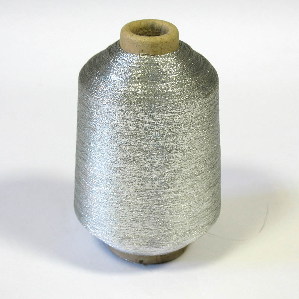 Нитка люрекс X-1 серебро /500г/ . Нитка Люрекс
