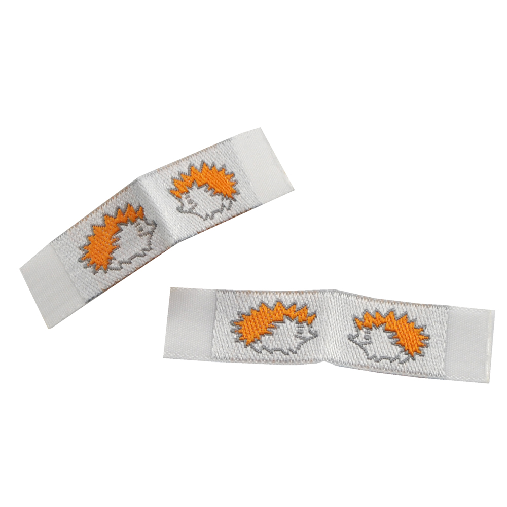 Этикетка тканевая вышитая штучная Berni Ёжик 1см, белая /90 atki/, шт. Вышивка / этикетка тканевая