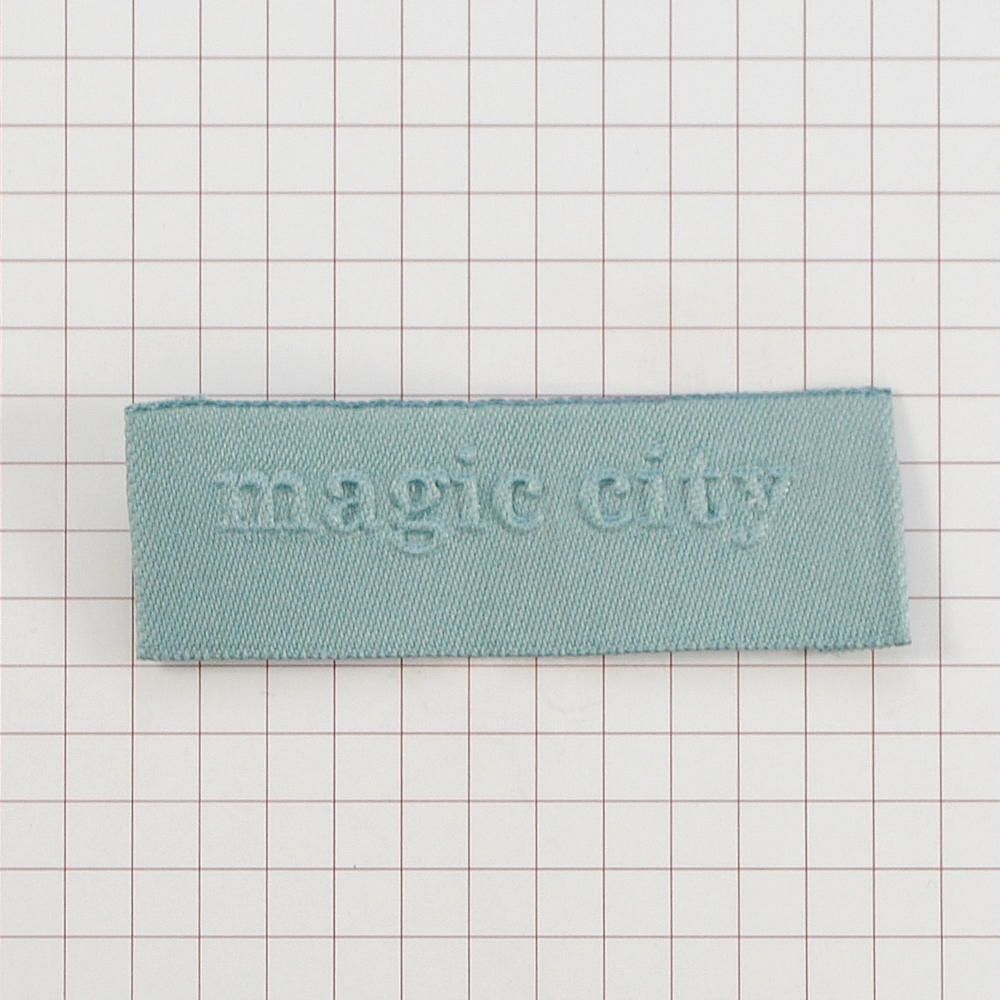 Этикетка тканевая вышитая шт. Magic City 2*7см морская волна, шт. Вышивка / этикетка тканевая