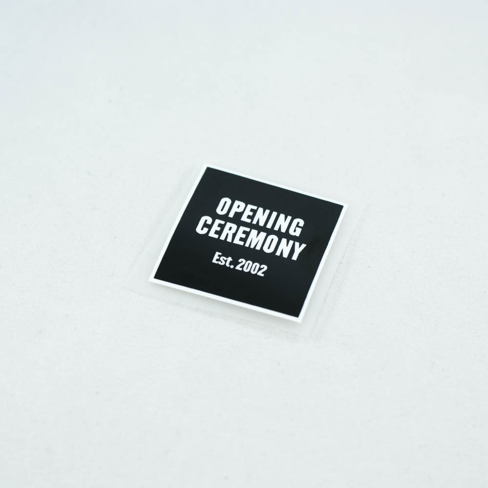 Термоаппликация резиновая Opening ceremony 30*30мм черная квадратная, белый текст, шт. Термопереводки Резиновые, Термопленка