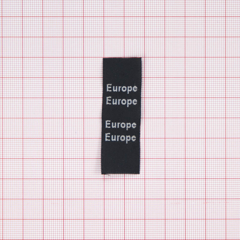 Этикетка тканевая вышитая Europe /флажок/ черная 1.9*6см . Вышивка / этикетка тканевая