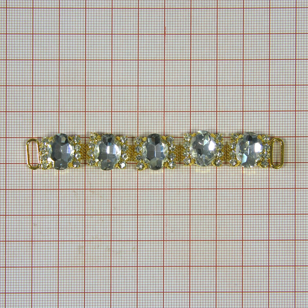 Укр.стекл. 9901 перетяж. 9,5*1,2см GOLD (овал), 8мелк.БЕЛЫЕ камни, 5 крупн.т-сиренев.овал.камня. Перетяжка металл со стразами