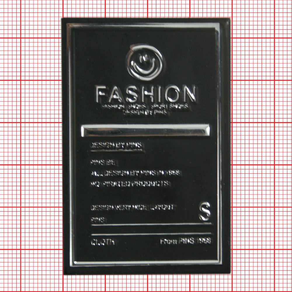 Лейба пластик Fashion смайлик 6*4см черный, серебро. Лейба Пластик