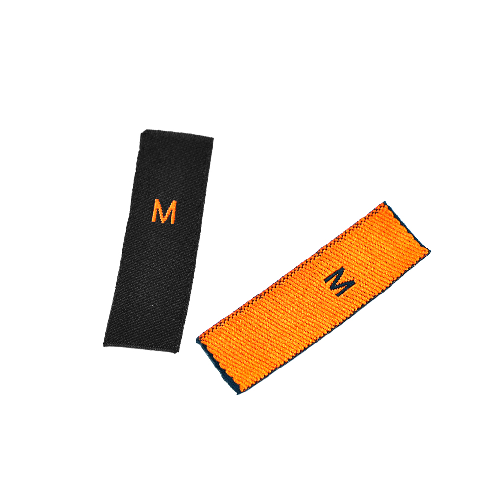 Размерник вышитый  M (черный, оранжевый) 50шт. Размерник вышитый черный