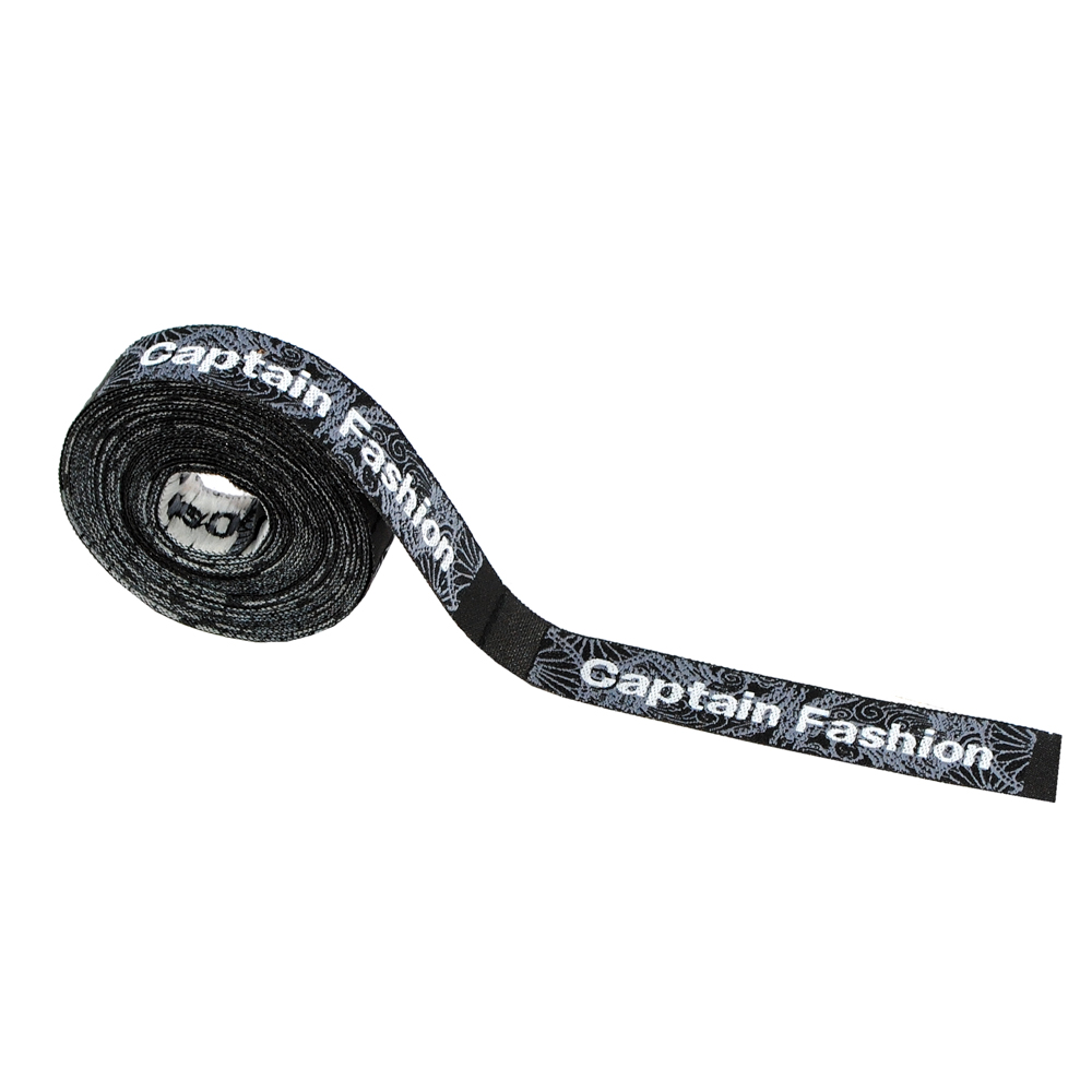 Этикетка тк.выш. Captain Fashion черная, серый узор /1.2 см/. Вышивка / этикетка тканевая