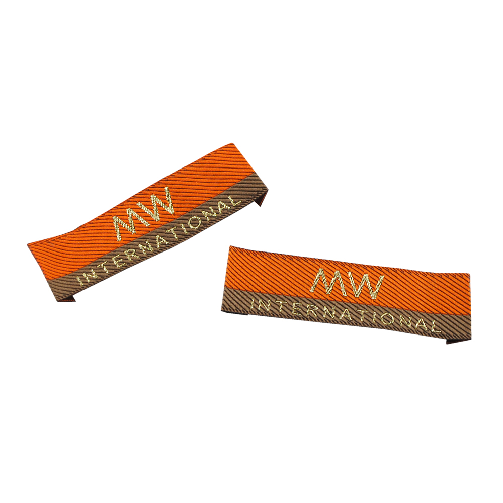 Этикетка тканевая вышитая шт. MW 2см коричнево-оранж., шт. Вышивка / этикетка тканевая
