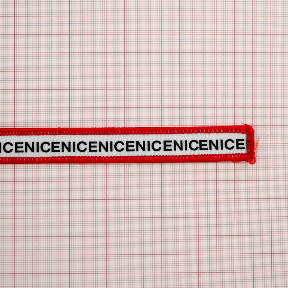 Нашивка тканевая NICE лента 26,5*1,8см, белая, черный, красный оверлок, шт. Нашивка Вышивка, Ткань