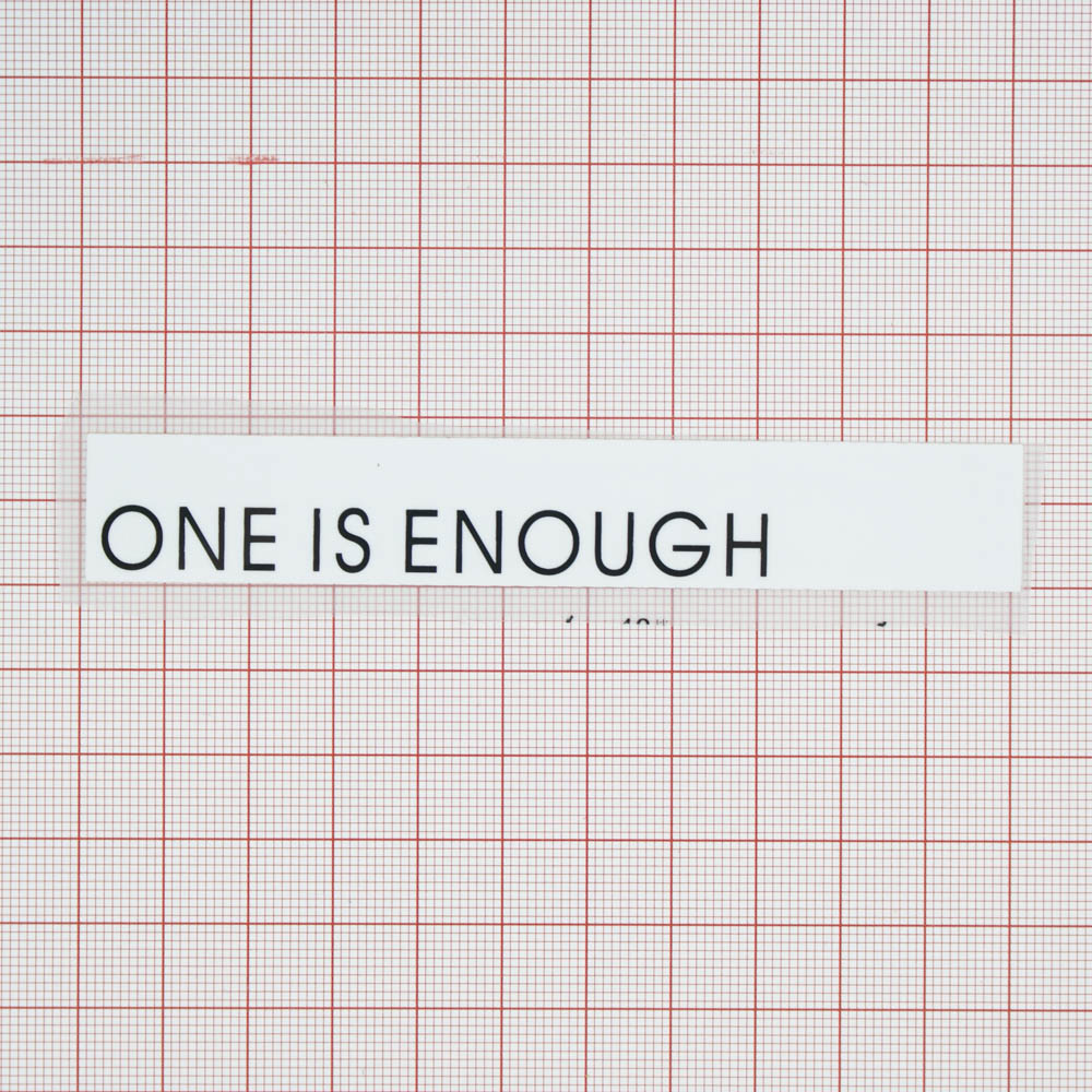 Термоаппликация резиновая ONE IS ENOUGH 110*19мм, черная надпись, белый фон, шт. Термопереводки Резиновые, Термопленка