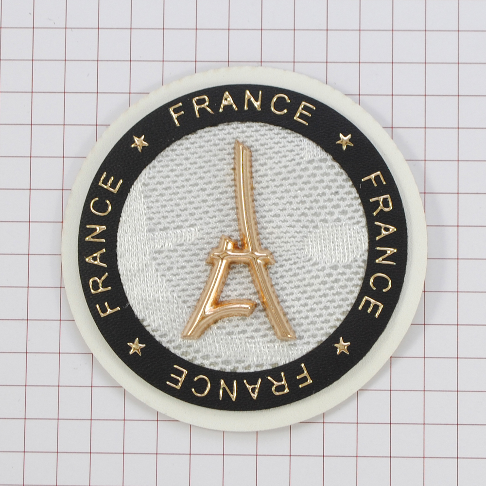 Лейба кожзам с текстилем France 57мм, круглая, белая с черным + мет. и надпись золото, шт. Лейба Кожзам