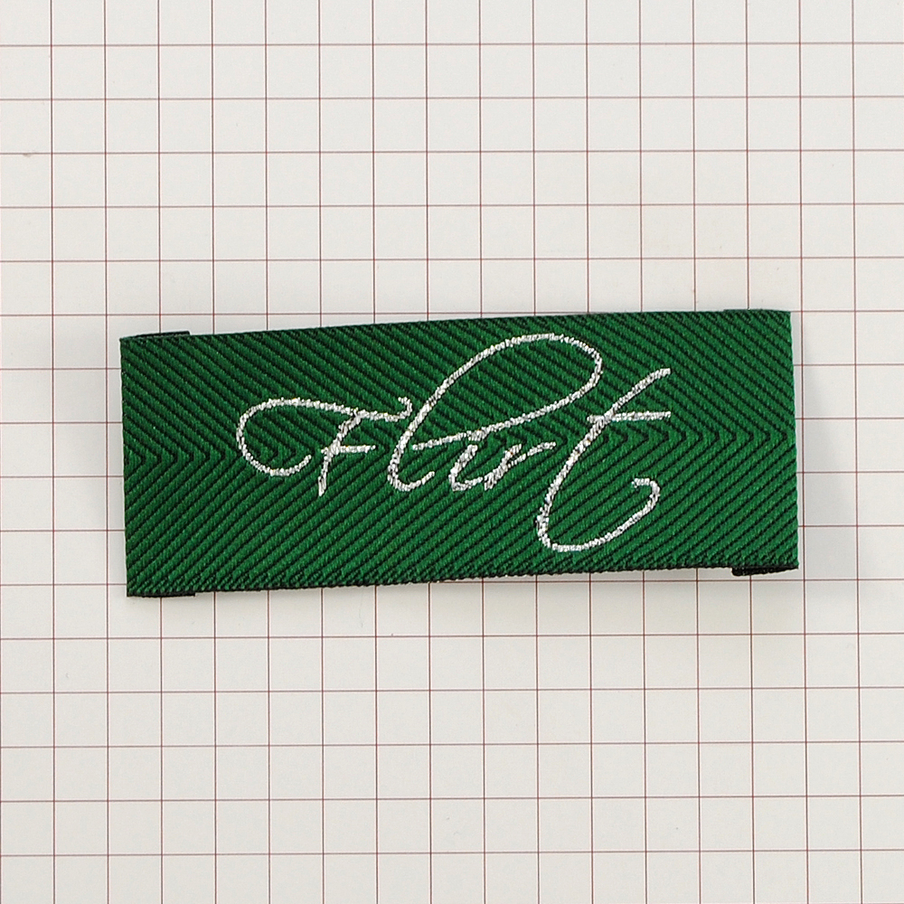 Этикетка тканевая вышитая шт. Flirt 2,5*7см зеленая, серебро, шт. Вышивка / этикетка тканевая