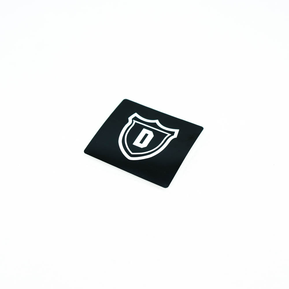 Термоаппликация резиновая D 36*33мм черная прямоугольная, белый лого, шт. Термопереводки Резиновые, Термопленка