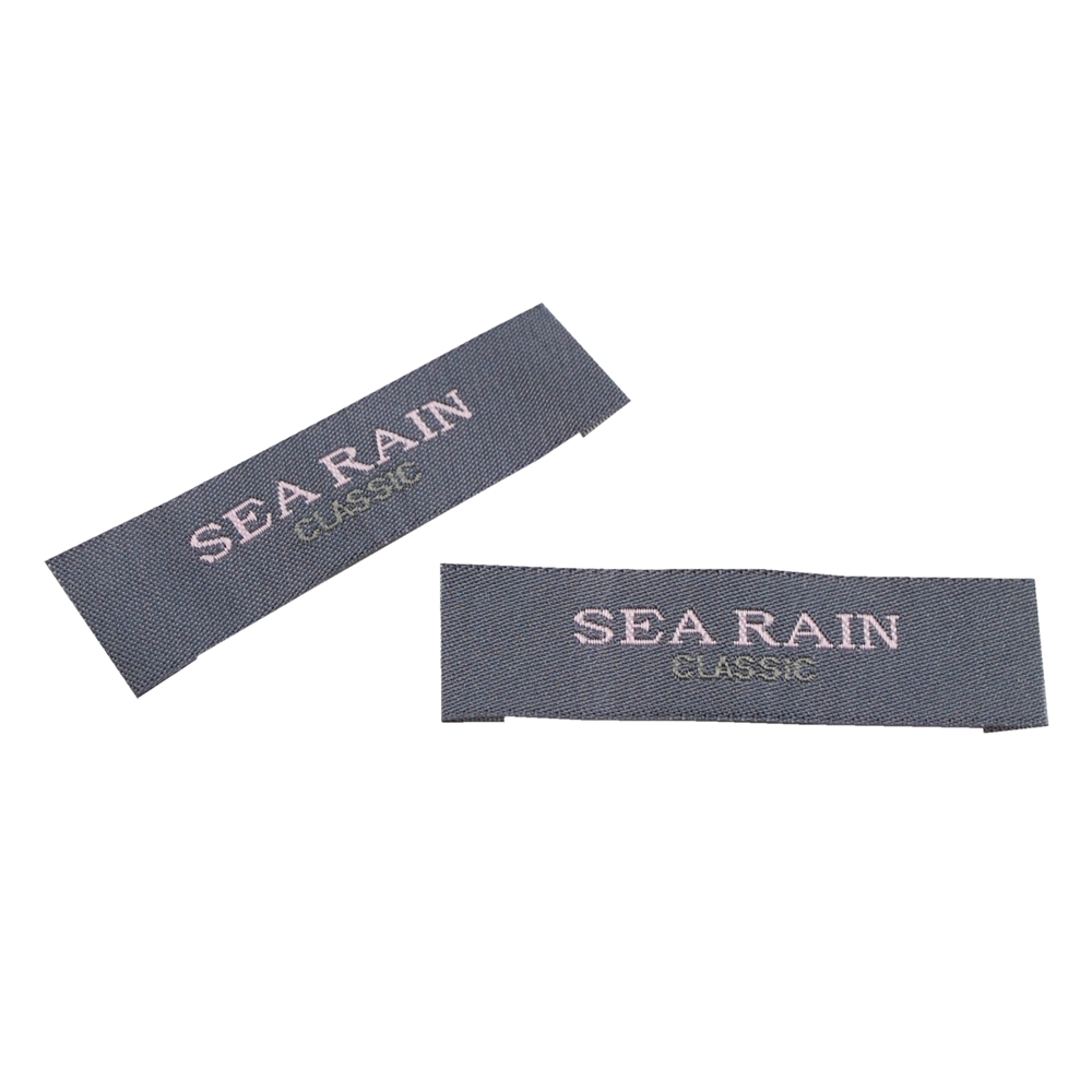 Этикетка тканевая вышитая шт. Sea Rain 1,6см серый, шт. Вышивка / этикетка тканевая
