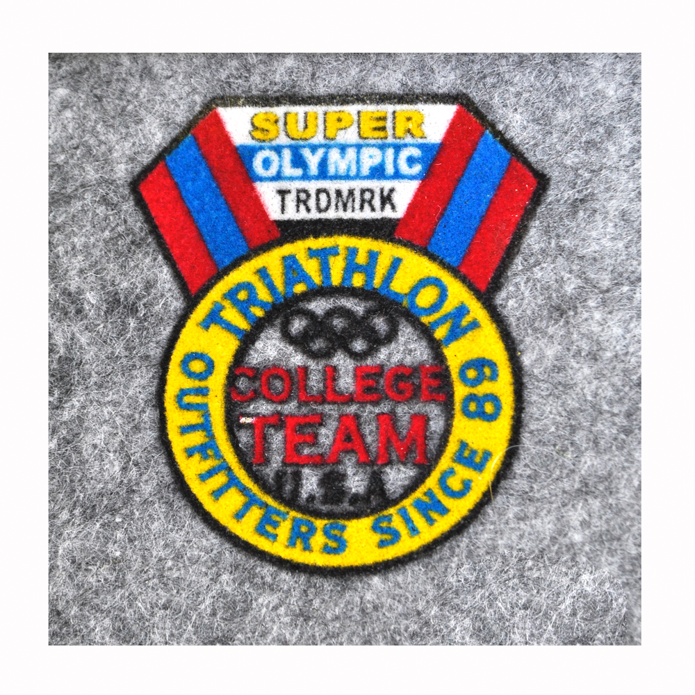 Термоаппликация флок SUPER OLIMPIC TRDMRK, 70*65мм, фигурная, черный, синий, красный, желтый круг, шт. Термопереводки Флок