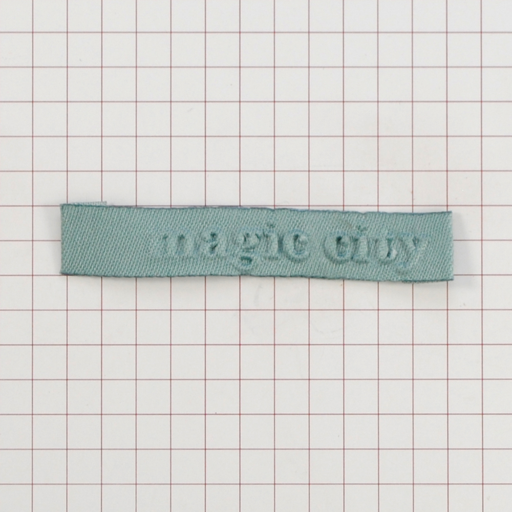 Этикетка тканевая вышитая шт. Magic City 1*7см морская волна, шт. Вышивка / этикетка тканевая