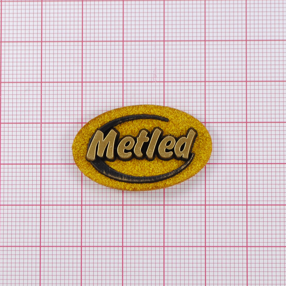 Лейба к/з Metled, 3,5*2см, овал, жёлтый фон, напыление, шт. Лейба Кожзам