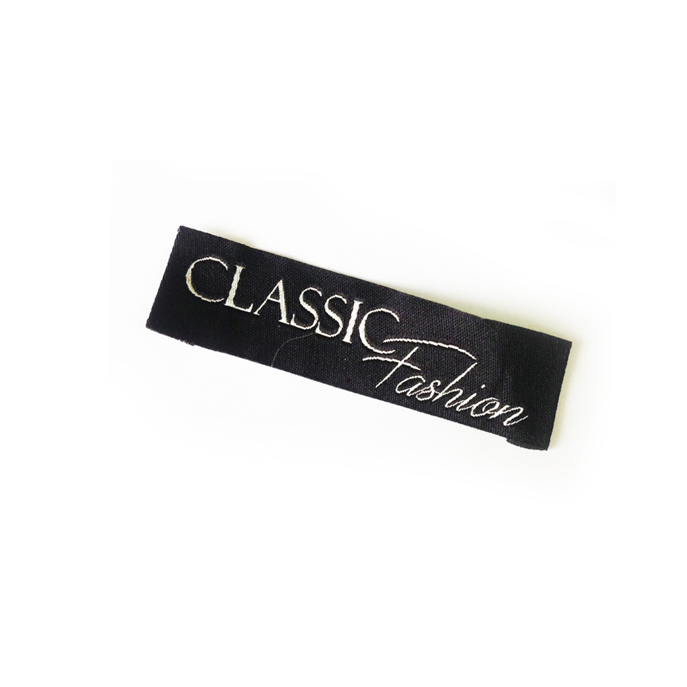 Этикетка тканевая вышитая Classic Fashion №7, 2*8см черная, серебро ацетат /Ye 70 atki/, шт. Вышивка / этикетка тканевая