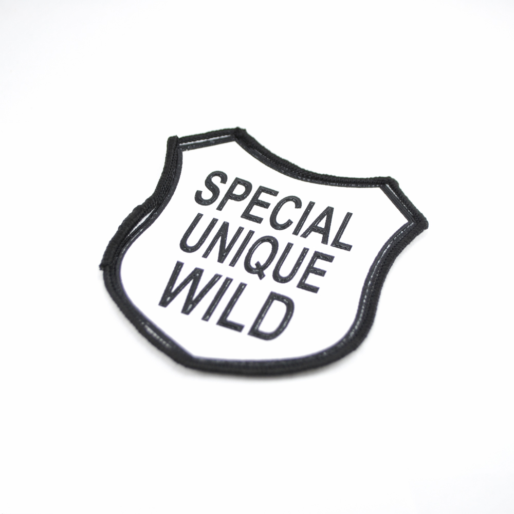 Нашивка тканевая Special Unique Wild 8,5*9,5см, бело-черная, резиновый рисунок. Нашивка Резиновый Конгрев