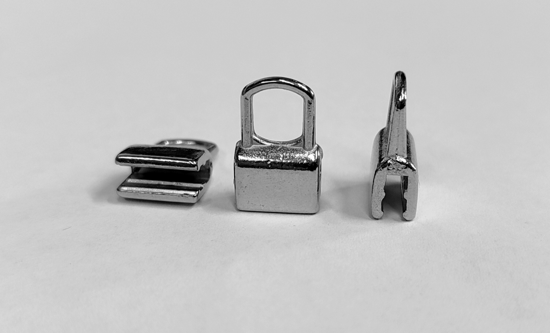 Зажим металл для лейбы под бегунок. Зажим