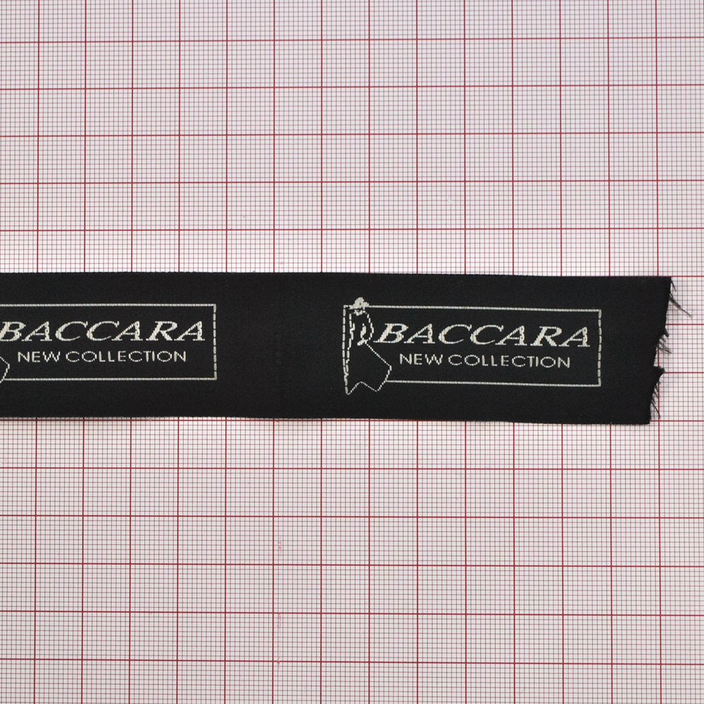 Этикетка тканевая вышитая Baccara черно-белая 3cм 100м. Вышивка / этикетка тканевая