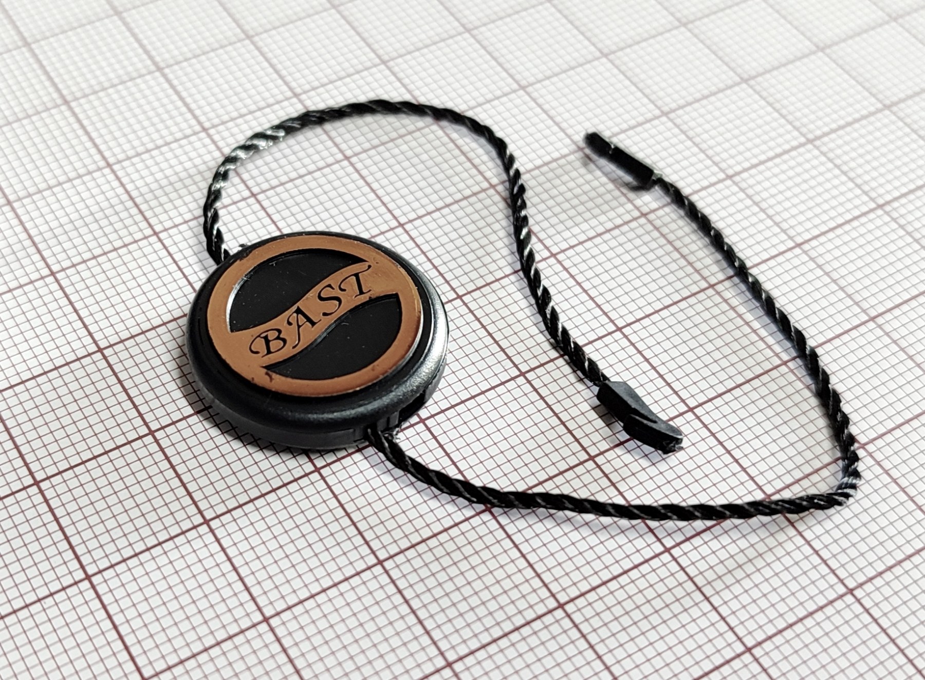 Пломба Bast, круглая, 2,2см, толщина 0,6см, 1т. шт. Пломба