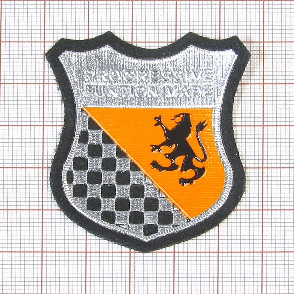 Нашивка тканевая резиновая накладка Лев оранжевый угол, шахматка-черный, серебро (№3). Нашивка Ткань