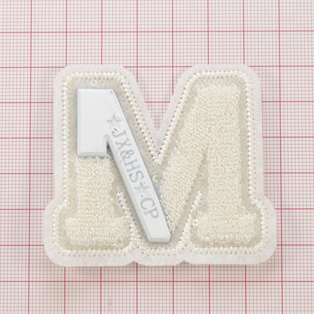 Нашивка махровая пришивная буква M с метал вставкой,6,4*5,5см, белый,  шт. Нашивка Махровая