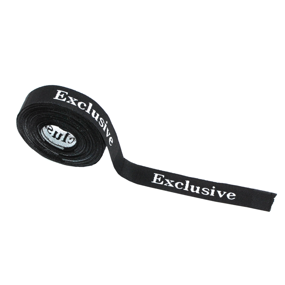 Этикетка тканевая вышитая Exclusive №6A, 1*7см черно-белая /atksatin/. Вышивка / этикетка тканевая