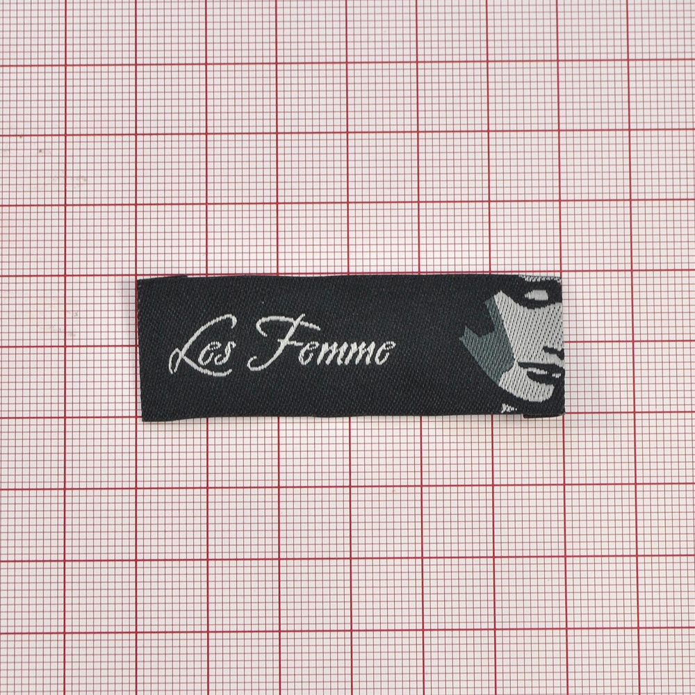 Этикетка тканевая вышитая шт. Les Famme 2*7см черная, серый, шт. Вышивка / этикетка тканевая