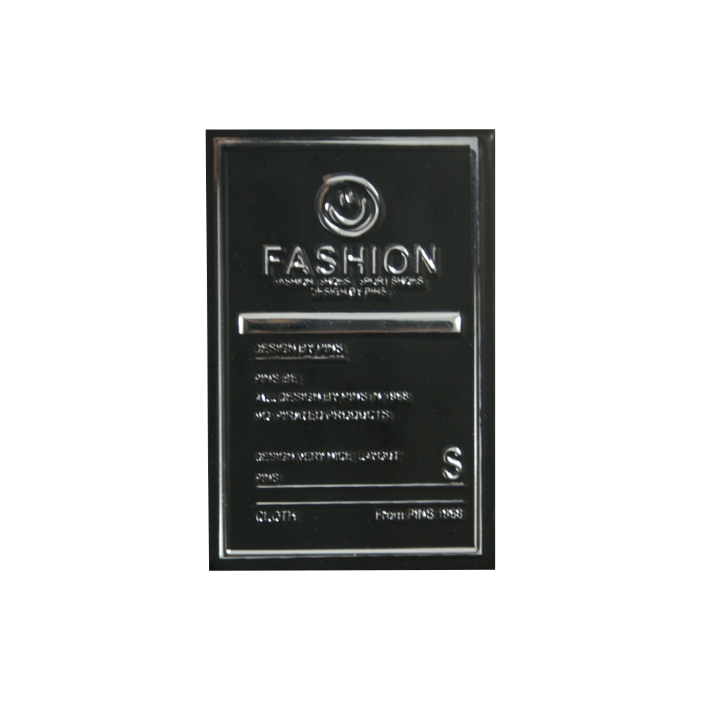 Лейба пластик Fashion смайлик 6*4см черный, серебро. Лейба кожзам, нубук